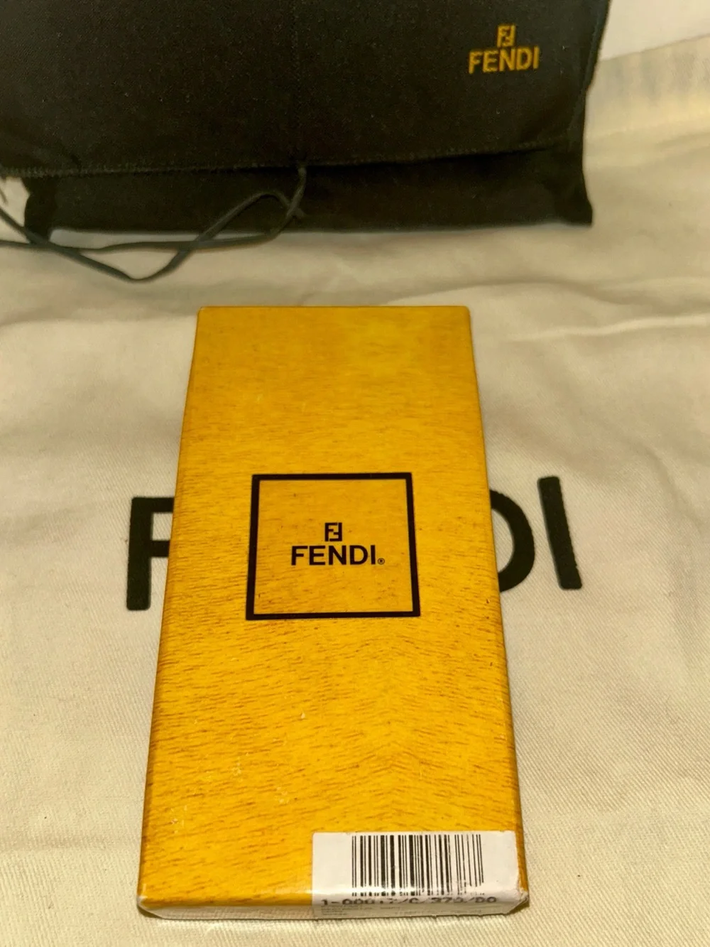 Fendi square leather keychain or Bag Charm.  Full Inclusion.  Vintage and Rare